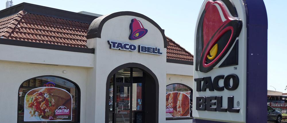 A sign is posted in front of a Taco Bell restaurant on May 01, 2024 in Richmond, California. 