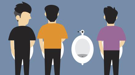 Mehrere Männer stehen vor einem Urinal (Symbolbild)
