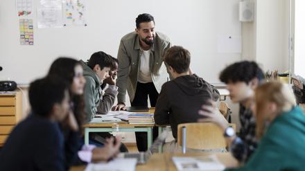 Teacher working in school classroom