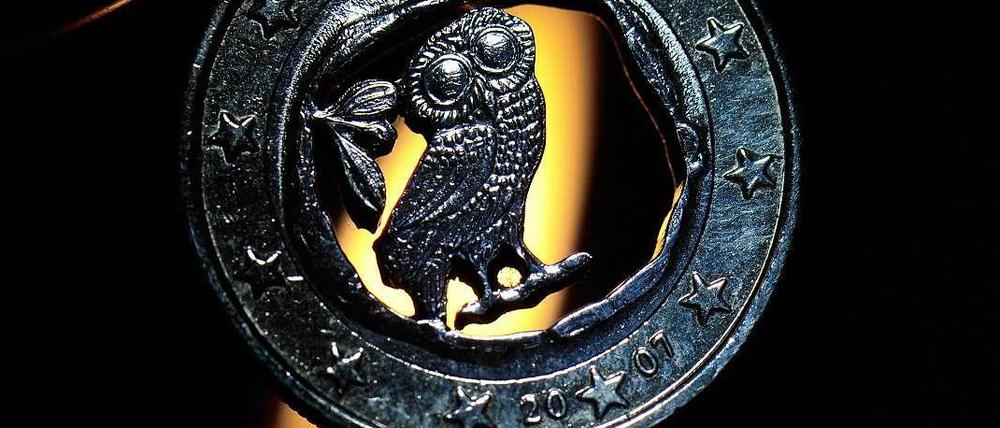 Eine verkohlte griechische Euro-Münze