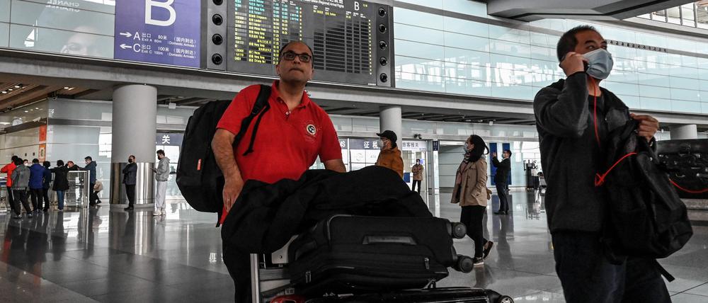 Künftig werden am Flughafen von Peking wieder mehr ausländische Touristen zu sehen sein. 