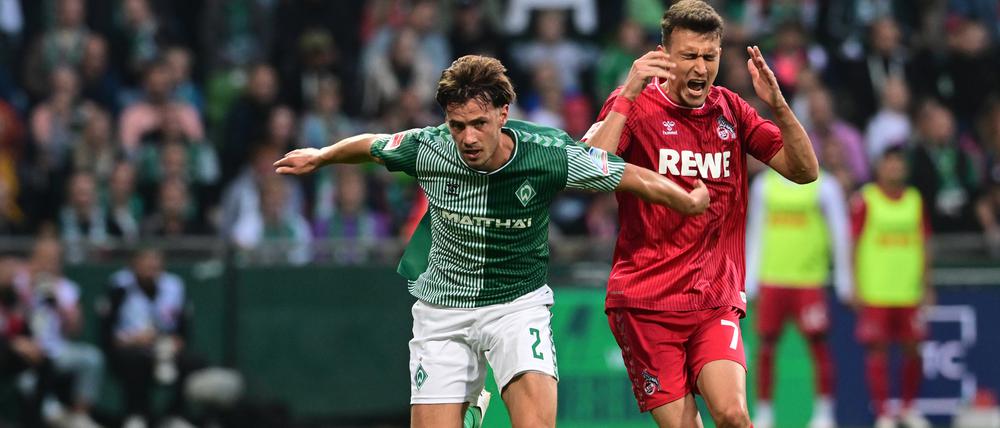 Das tut weh. Dejan Ljubicic (r.) muss mit dem 1. FC Köln im fünften Saisonspiel die sechste Niederlage einstecken.  