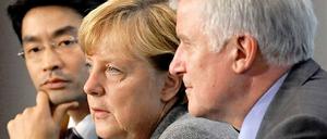 Geeinigt. Angela Merkel, Horst Seehofer und Philipp Rösler.