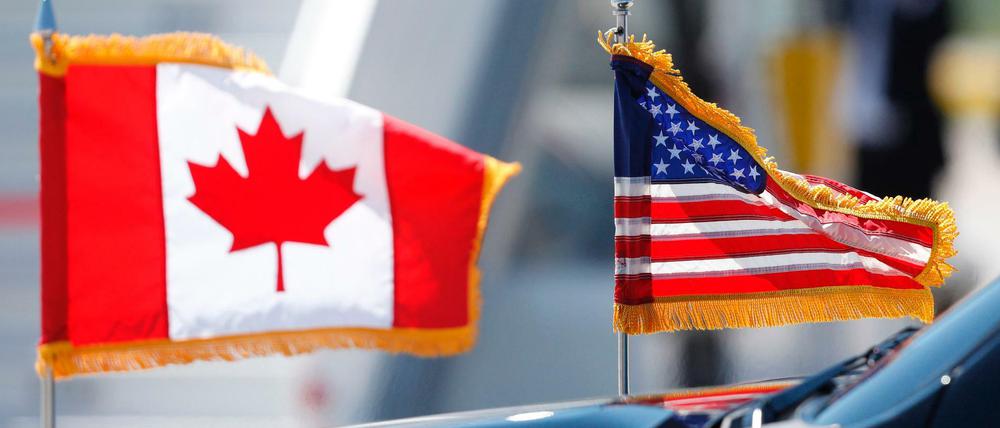 Einigung bei Nafta: Flaggen der USA und Kanadas 