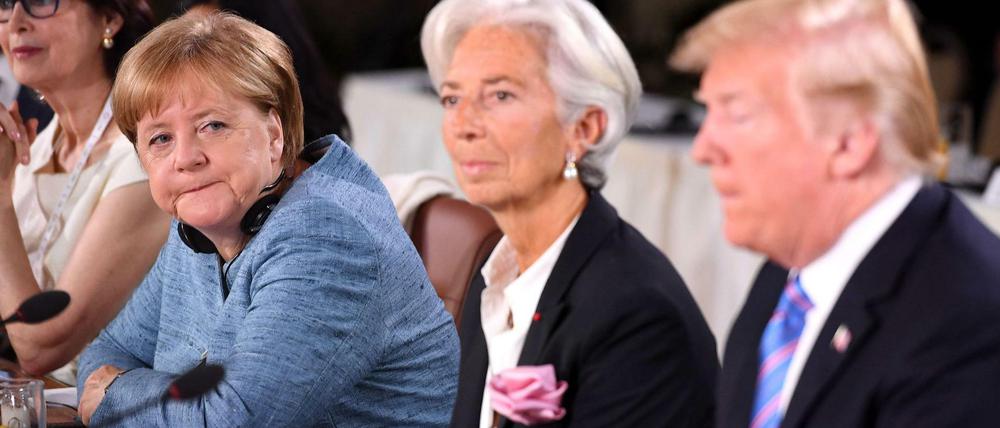 Kanzlerin Angela Merkel, IWF-Chefin Christine Lagarde und US-Präsident Trump beim G7-Gipfel