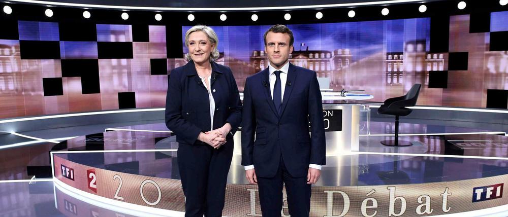 Harter Schlagabtausch. Die rechtsextreme Kandidatin Marine Le Pen und der Sozialliberale Emmanuel Macron.