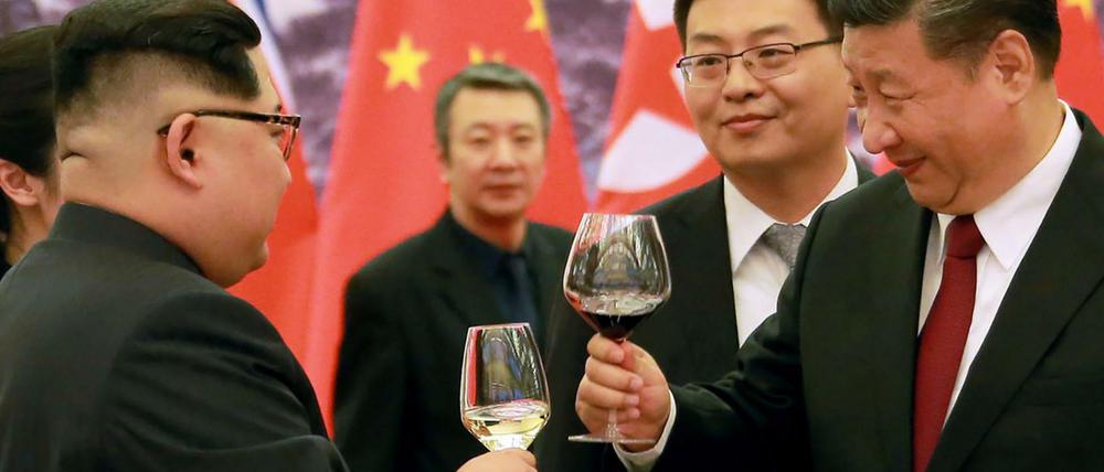 Kim Jong Un und Xi Jinping in Peking