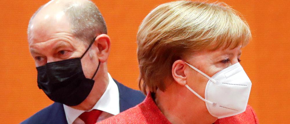 Sie wollen mehr richten: Kanzlerin Angela Merkel und Vizekanzler Olaf Scholz.