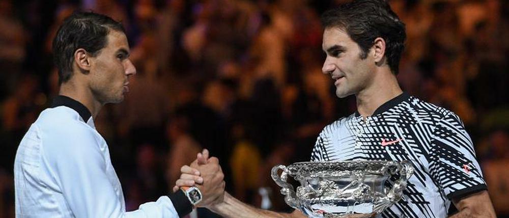 Hand drauf! Nadal und Federer sind auf dem Tennisplatz wie füreinander geschaffen.