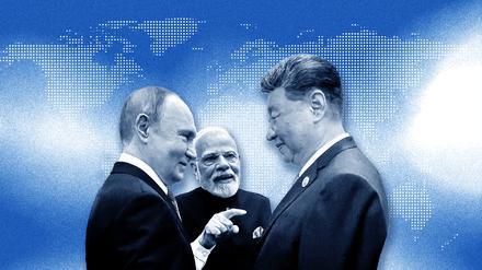 Der russische Präsident Wladimir Putin, der indische Premierminister Narendra Modi und der chinesische Präsident Xi Jinping unterhalten sich vor dem Gipfeltreffen der Shanghaier Organisation für Zusammenarbeit (SOZ) im Meijiang Convention and Exhibition Center.