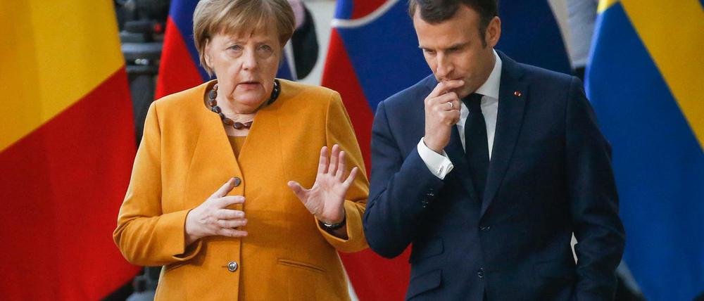 Bundeskanzlerin Angela Merkel (CDU) und Frankreichs Präsident Emmanuel Macron beim EU-Gipfel in Brüssel.