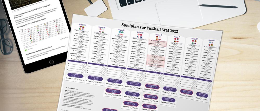 Ein Fußball WM-Spielplan 2022 als PDF zum Ausdrucken liegt auf einem Tisch.