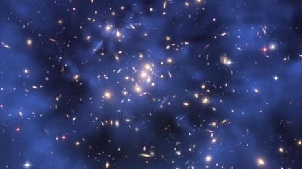 Ein Ring Dunkler Materie in einem fünf Milliarden Lichtjahre entfernten Galaxienhaufen im Sternbild Fische. 