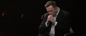 Elon Musk reacts as he visits the Vivatech technology startups and innovation fair at the Porte de Versailles exhibition center in Paris, on June 16, 2023. 