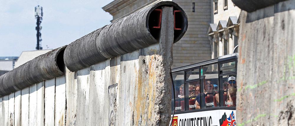 Überreste der Berliner Mauer. Die vielfach gebrochene Geschichte der Stadt ist ein einzigartiger Standortfaktor. Die Vergangenheitslast ist einer Vergangenheitslust gewichen, schreibt Hanno Hochmuth.