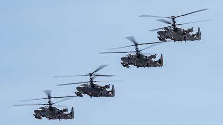 Russia,  Khabarovsk  -  May  7,  2020:  Parade  in  honor  of  victory  Military  air  parade  in  honor  of  Victory  Day.  K-52  helicopters  alligator  fly  in  formation. xkwx air,  aircraft,  aviation,  attack,  helicopter,  military,  blue,  may,  victory,  army,  airshow,  sky,  flight,  group,  alligator,  celebration,  force,  2015,  blade,  anniversary,  celebrate,  assault,  parade,  air  force,  blue  sky,  airplane,  airport,  content,  engine,  exhibition,  festival,  fighting,  fly,  over,  2013,  aeroplane,  base,  clear,  cockpit,  demonstration,  exhibit,  part,  square,  armed,  armor,  battle,  business,  camouflage,  chopper,  clouds