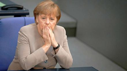Unter Druck: Angela Merkel wurde beim Euro-Gipfel insbesondere vom italienischen Premier Mario Monti zugesetzt.