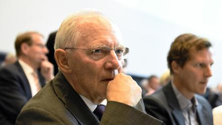 German Finance Minister Wolfgang Schaeuble waits for the start of a parliamentary group meeting of the Christian Democratic Union party (CDU) in Berlin on July 16, 2015 the day before German lawmakers vote in the Bundestag on entering into negotiations on the new aid package for Greece. AFP PHOTO / TOBIAS SCHWARZ
