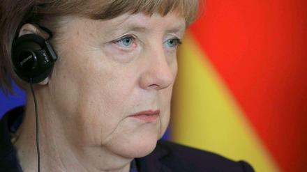 Sie hört viel, sagt aber wenig, jedenfalls zur BND-NSA-Affäre - Angela Merkel, Bundeskanzlerin.