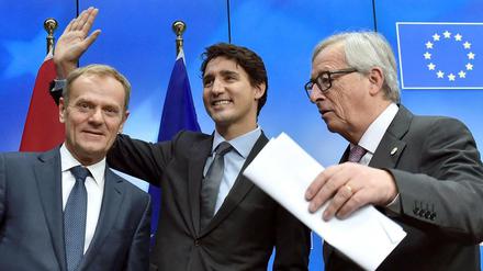 Donald Tusk, Justin Trudeau und Jean-Claude Juncker (l-r).