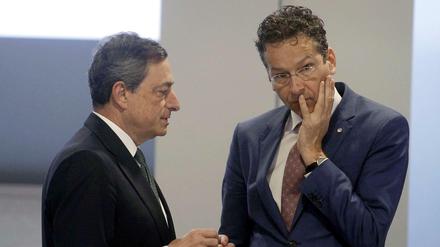Der Präsident der Europäischen Zentralbank, Mario Draghi (links) und Euro-Gruppenchef Jeroen Dijsselbloem.