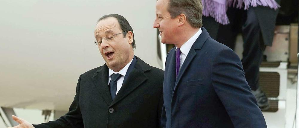 Hollande (links) besucht Cameron in Großbritannien.