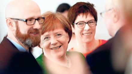 Der scheidende CDU-Generalsekretär Peter Tauber, Bundeskanzlerin Angela Merkel, die auch einmal dieses Amt innehatte, sowie seine Nachfolgerin Annegret Kramp-Karrenbauer. 