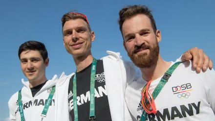 Bitte lächeln. Die deutschen Radrennfahrer Emanuel Buchmann, Tony Martin and Simon Geschke (von links). 