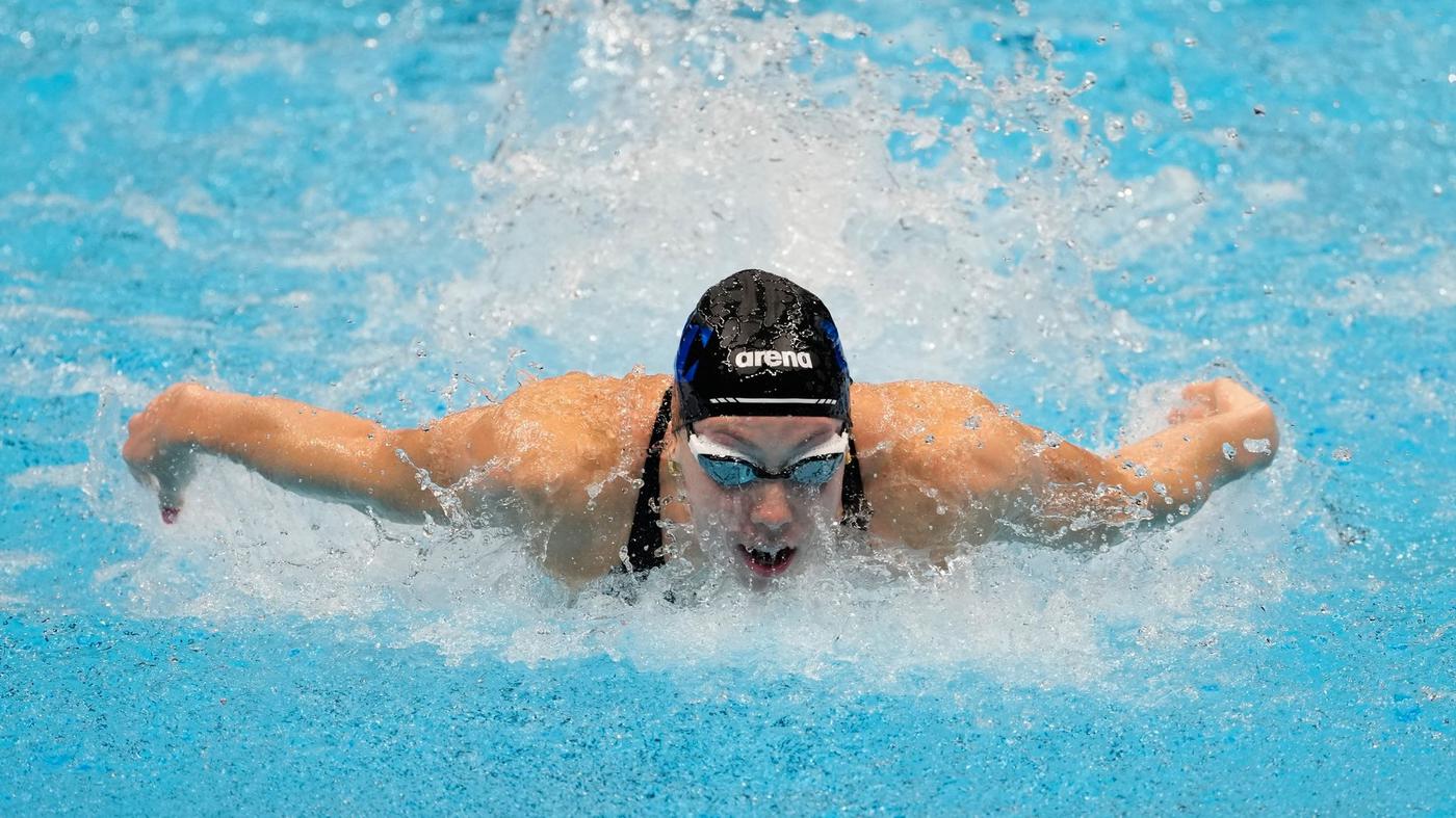 Walsh swims world record over 100 meters butterfly