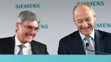 Siemens-Chef Joe Kaeser (links) und sein designierter Nachfolger Roland Busch. 