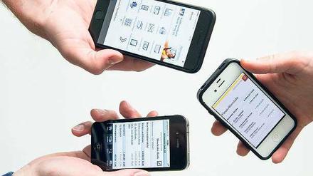 Handlich. Fünf  Millionen Deutsche fragen ihren Kontostand mittlerweile per App auf dem Smartphone ab. 