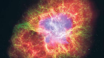 Gammaschleuder. Bei einer Sternenexplosion werden unter anderem Gammastrahlen ins Universum abgestrahlt. Die Abbildung zeigt den Krebsnebel, den Rest einer Supernova im Sternbild Stier. 